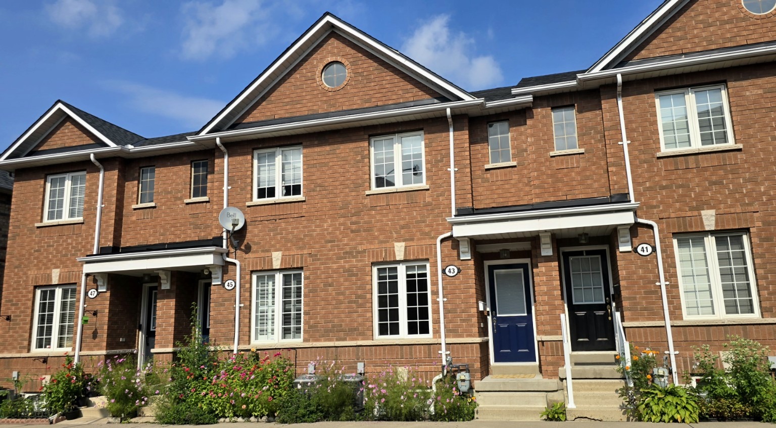 Red-brick townhouses at 43 Brickworks Lane, Toronto